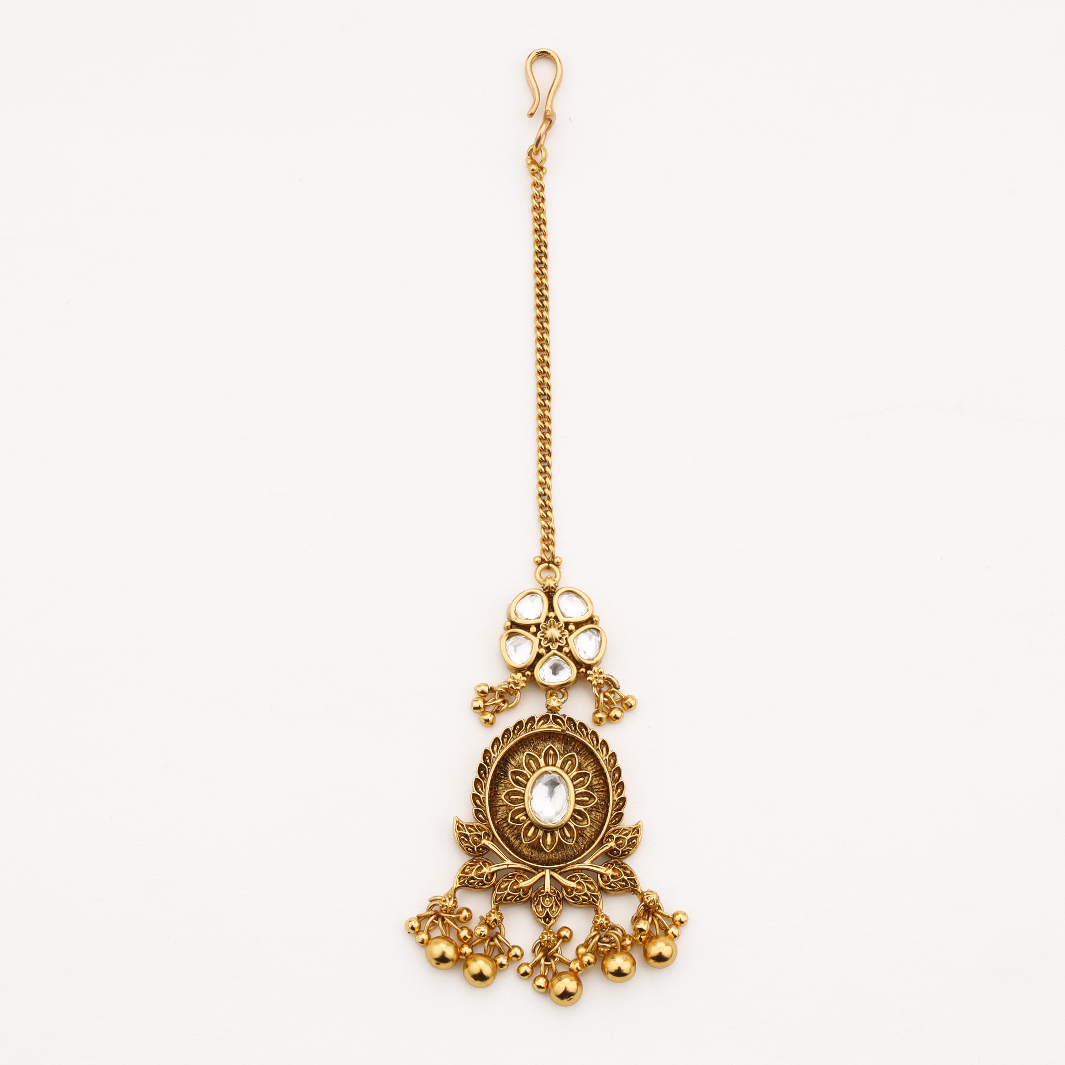 Diamond heritage floral Maang Tika in antique gold finish with hanging bead charms by US Catalog
